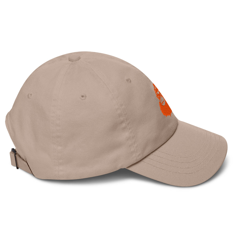 Beige cap with a small orange logo on a white background