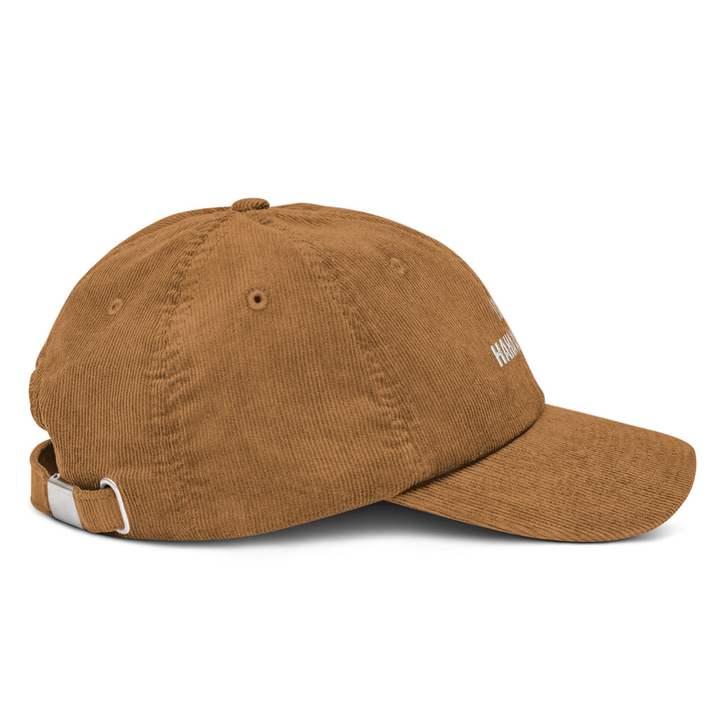 Brown cap with a white logo on a white background