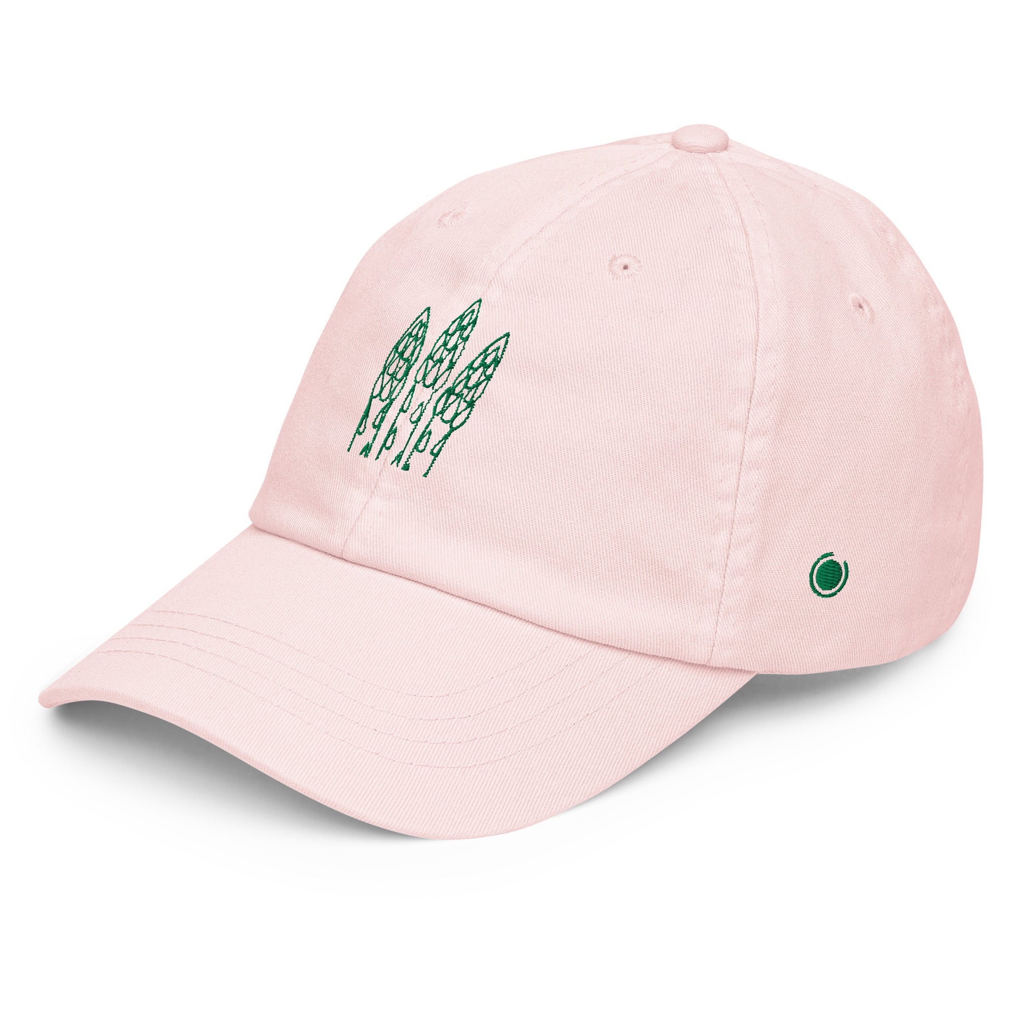 A light pink baseball cap with green embroidered asparagus graphics on the front and a small green circular logo on the side, shown on a clean white background.
