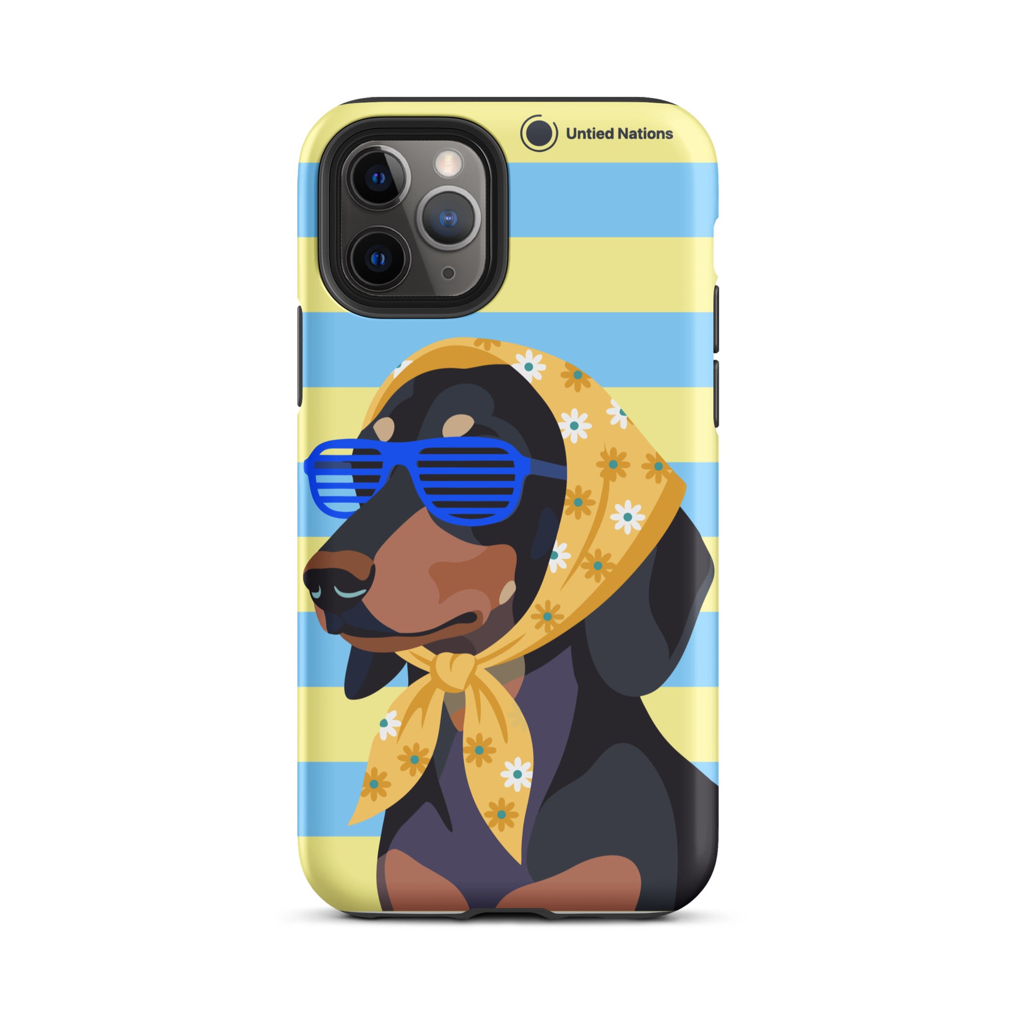 A phone case featuring a cartoon dachshund wearing blue shutter sunglasses and a yellow floral bandana, set against a light blue and yellow striped background. The case has 'United Nations' printed near the top right.