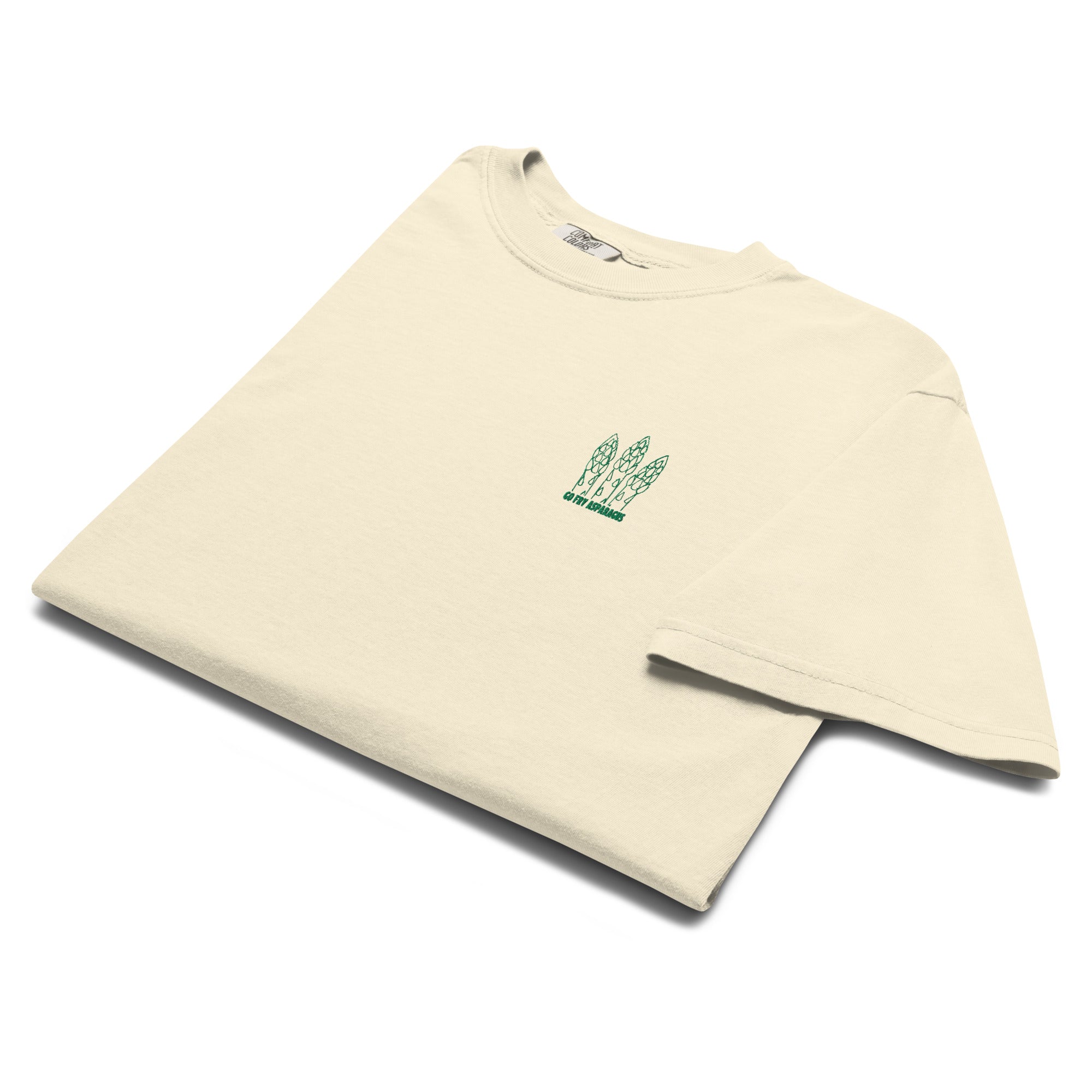 Folded beige t-shirt with an embroidered asparagus graphic and the text "Go fry asparagus" on the left chest