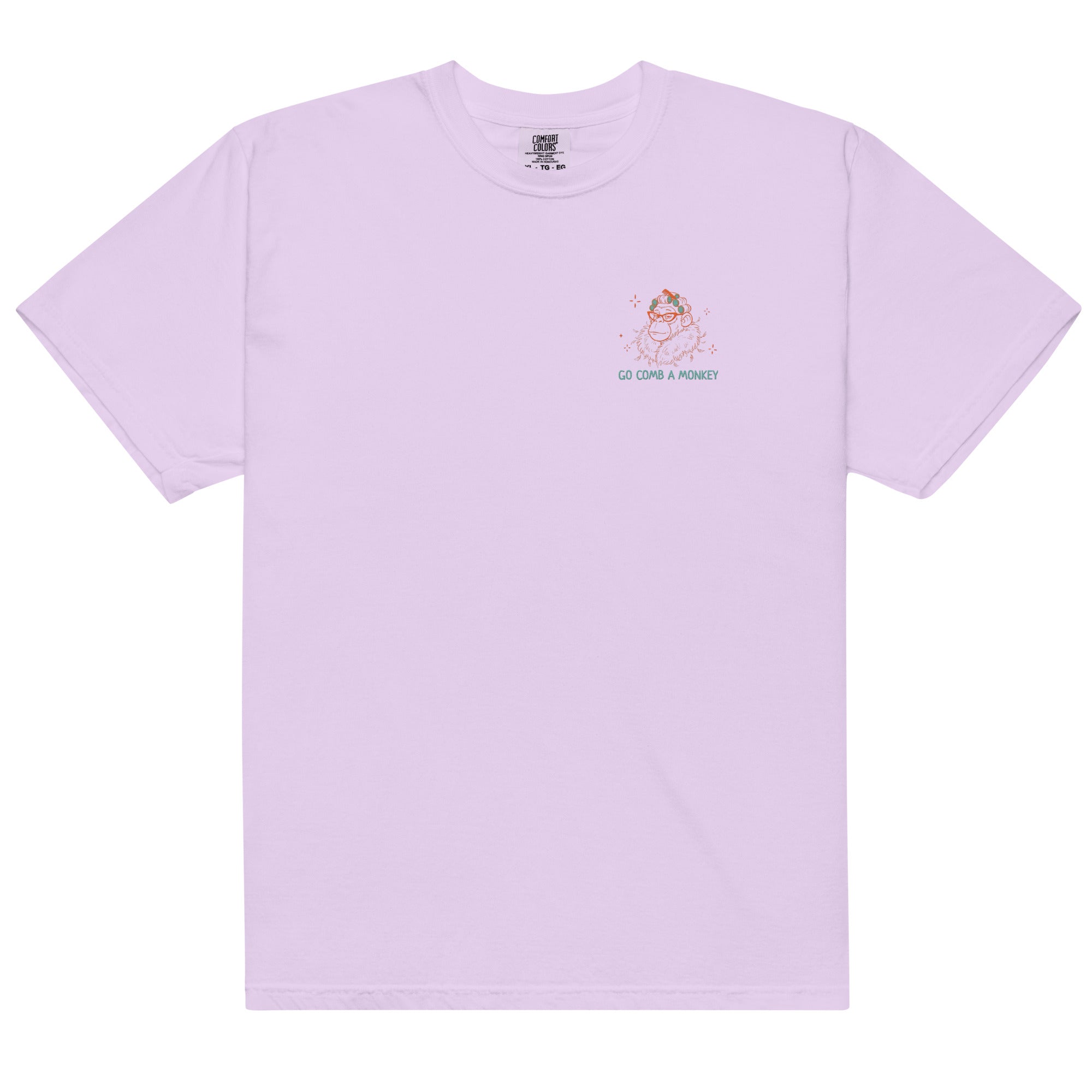 A light lavender crewneck t-shirt with a small graphic on the left chest showing a cartoon monkey
