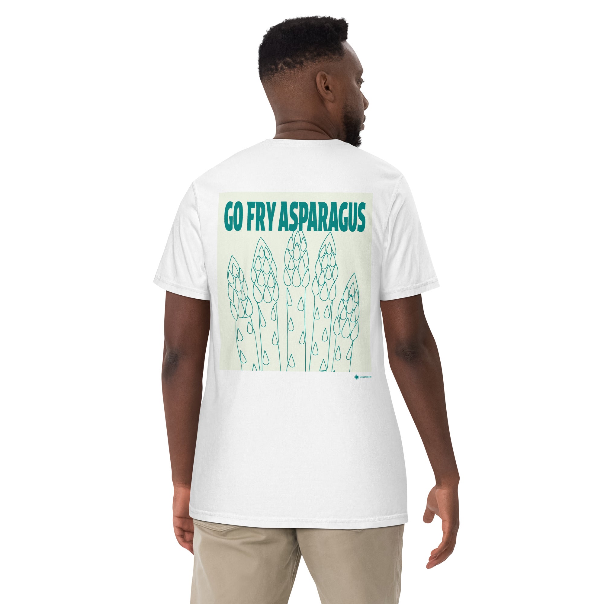 A man viewed from the back wearing a white t-shirt with a graphic print that reads 'GO FRY ASPARAGUS' in teal above a line drawing of asparagus spears on a pale yellow-green background.