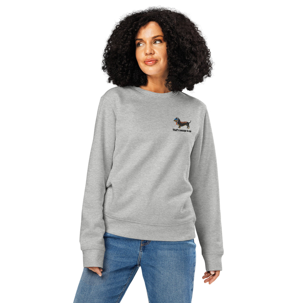 Person wearing a gray sweatshirt with  logo on a white background
