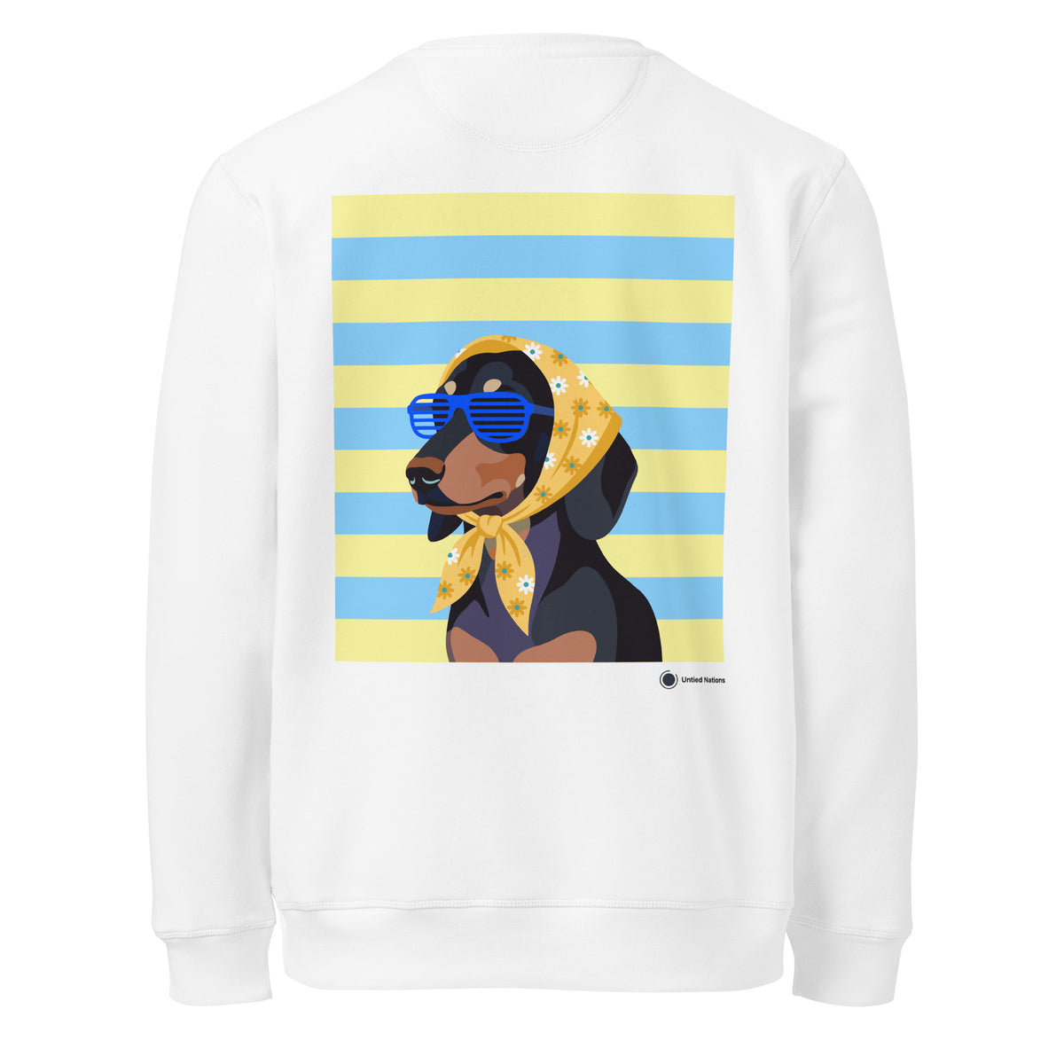 A white crewneck sweatshirt shown from the back, featuring a large graphic print of a black and tan dog wearing a yellow bandana with white daisy flowers and blue sunglasses, set against a background of yellow and blue horizontal stripes.