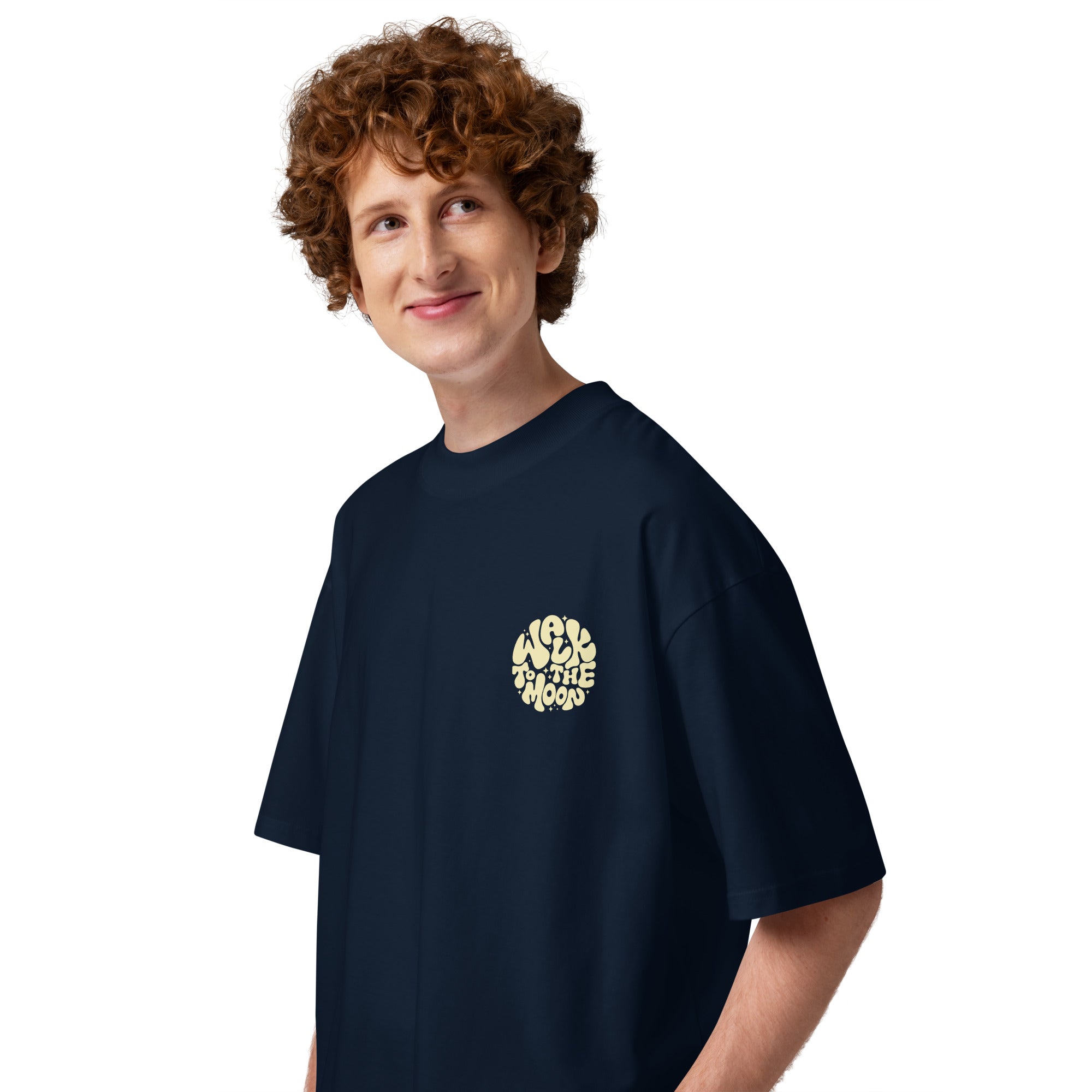 Person wearing a navy t-shirt with logo on a white background