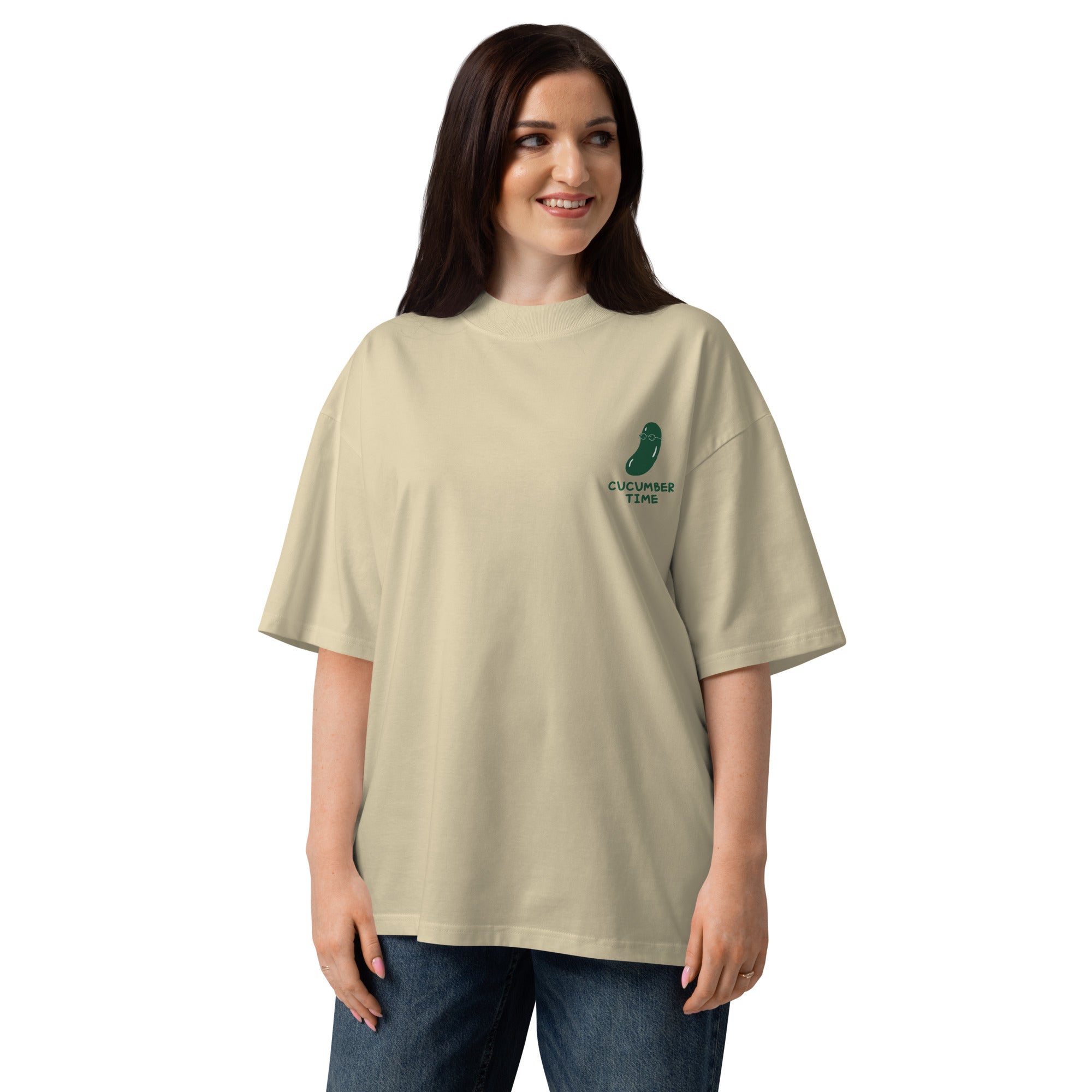 Woman wearing a beige t-shirt with a logo on a white background